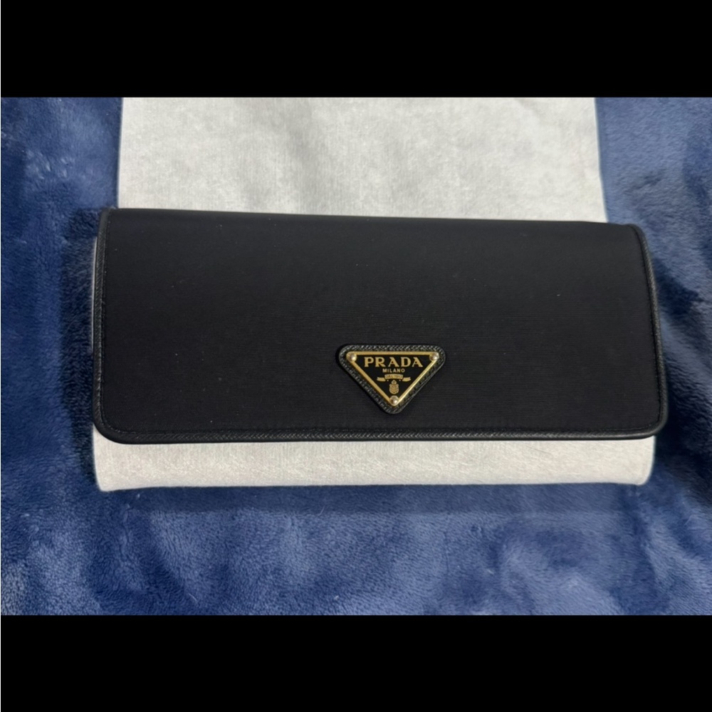 Prada Black Leather Flap Wallet with Gold Logo